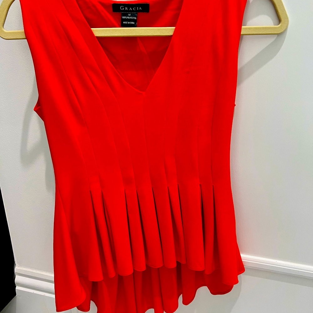 Peplum orange tank